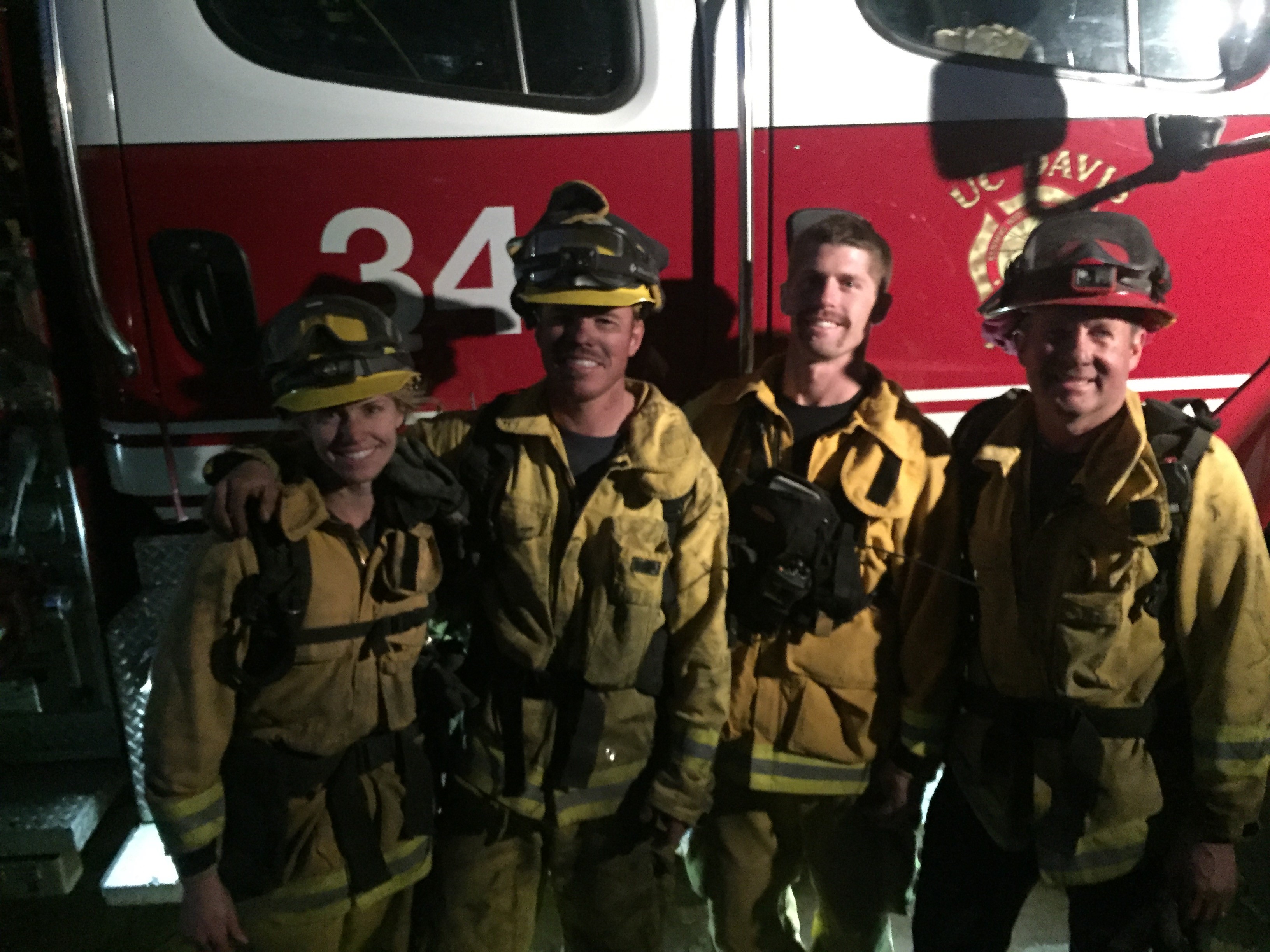 Group of firefighters standing in line