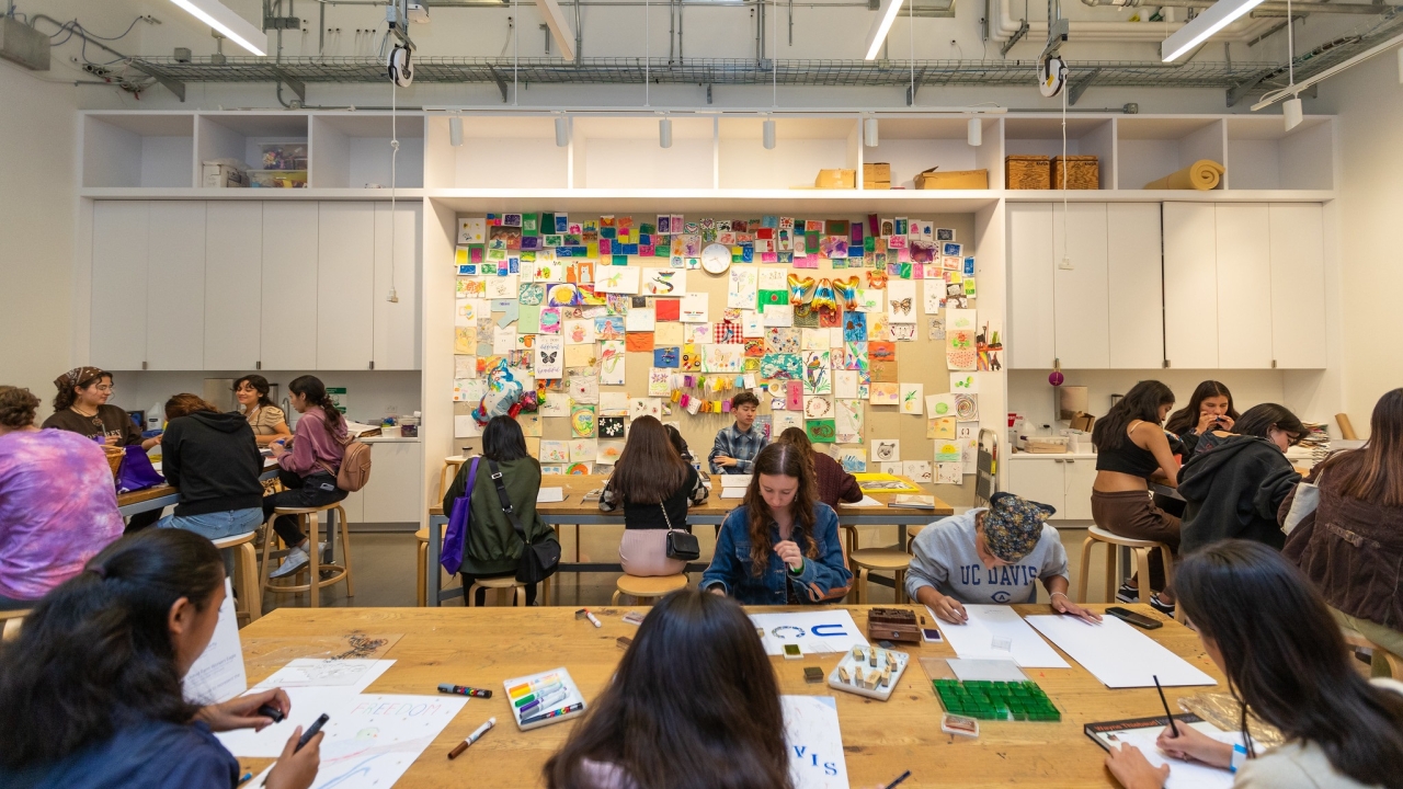 group of students work on art projects