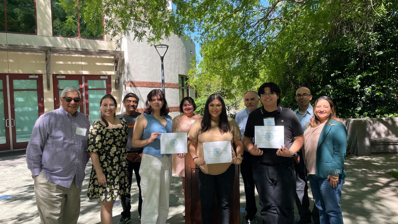 Photo of Students posing with scholarship awards