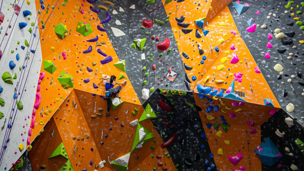 A woman on a climbing wall