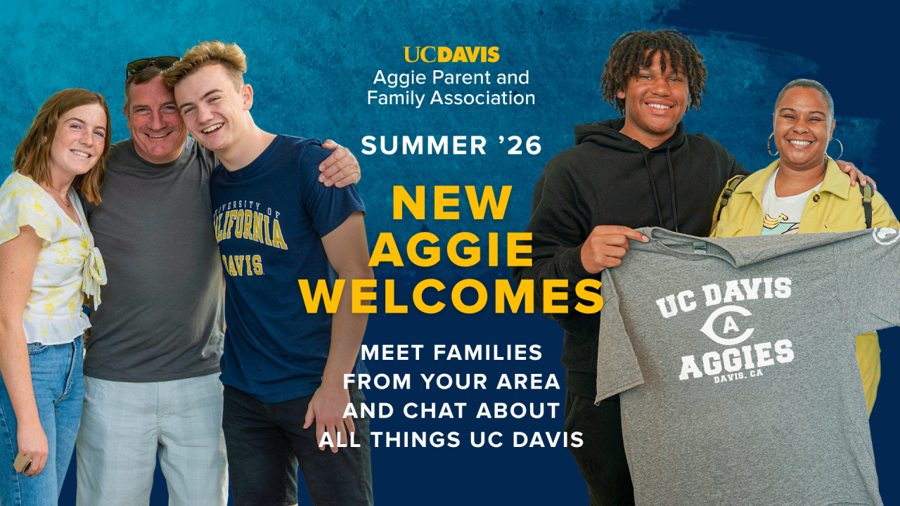 Five smiling diverse people posing before a blue-and-yellow UC Davis welcome banner